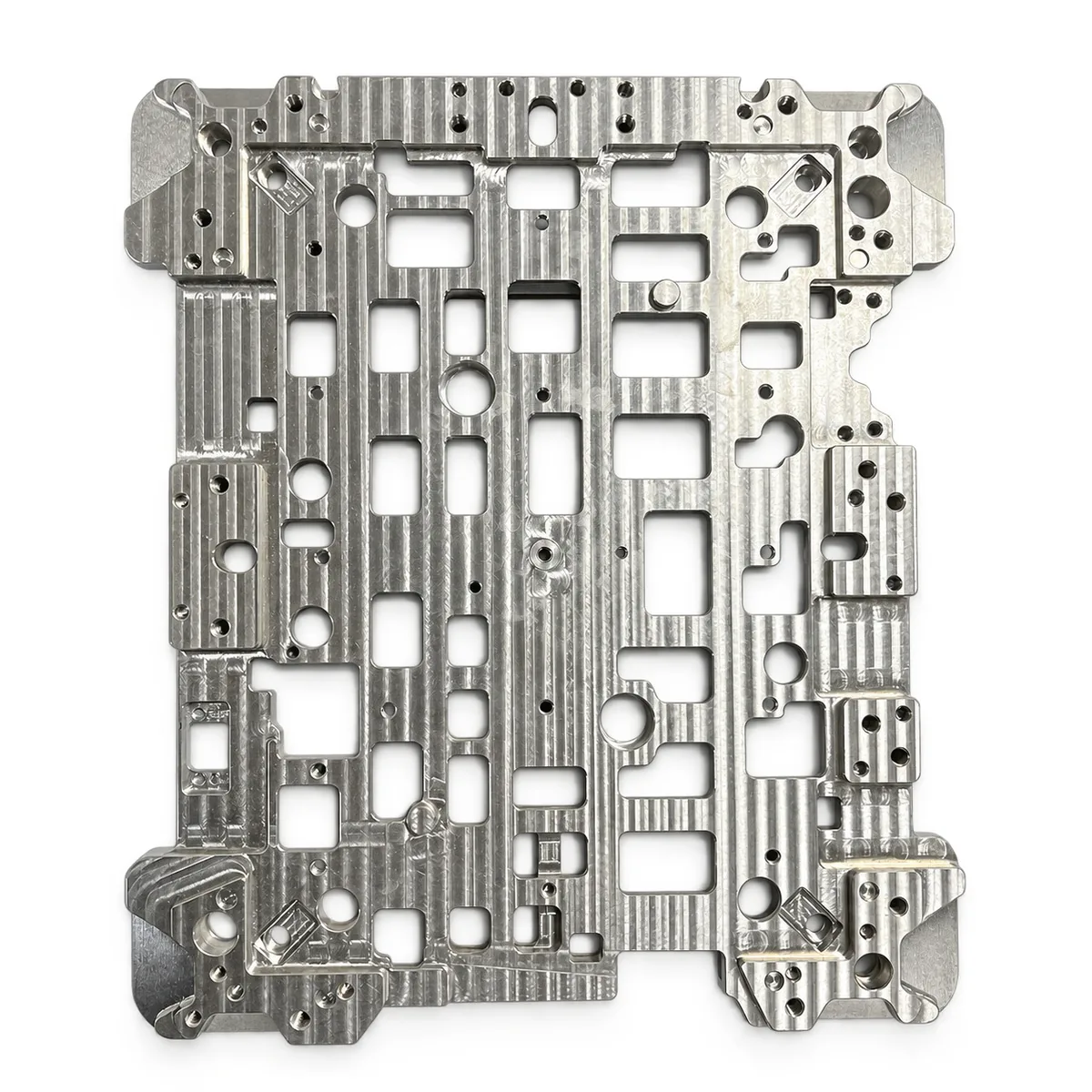 Machined channel plate with pockets, channels and perimeter holes