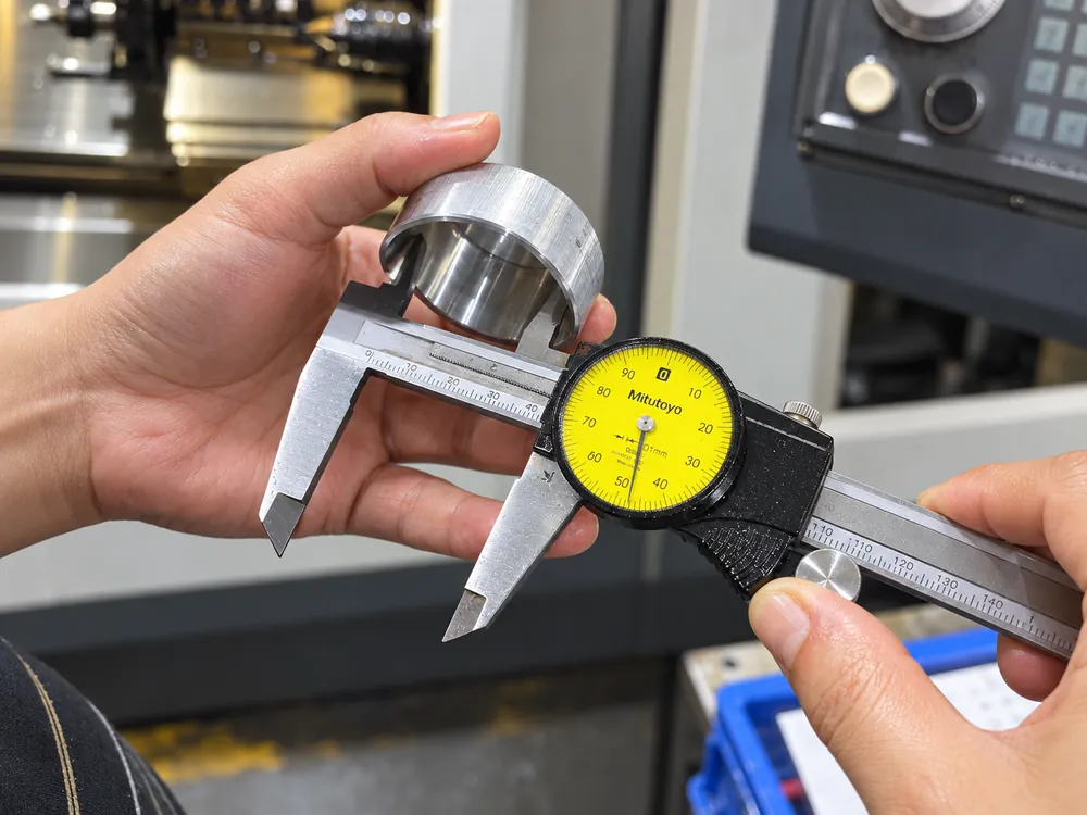 Dimensional check with a dial caliper